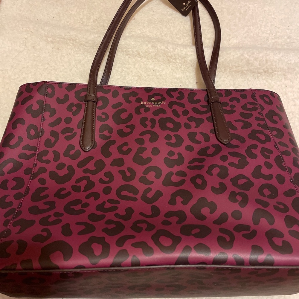 Kate spade tote, bought brand new used but new condition used a couple of times